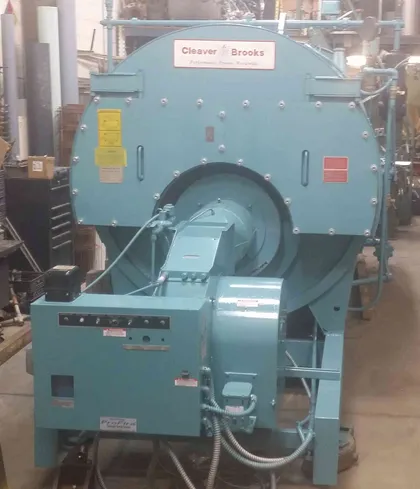 Cleaver-Brooks firetube boiler with its ProFire burner and control panel inside the Richfield shop