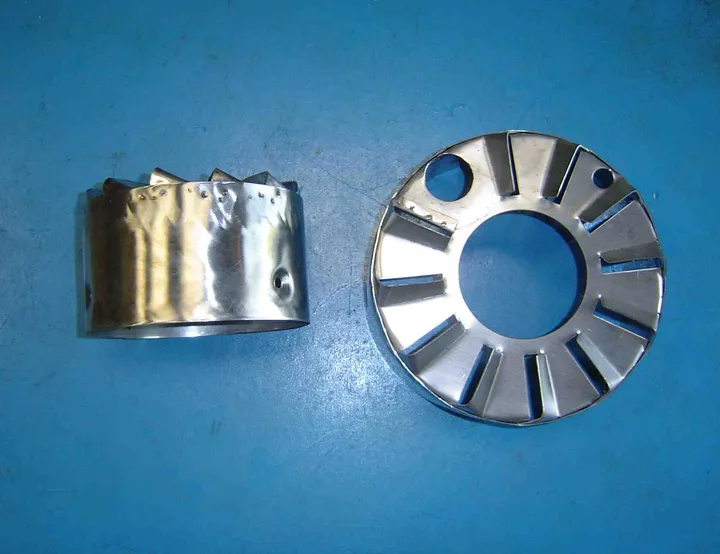 Polished stainless burner diffuser plate and combustion sleeve for a Cleaver-Brooks burner